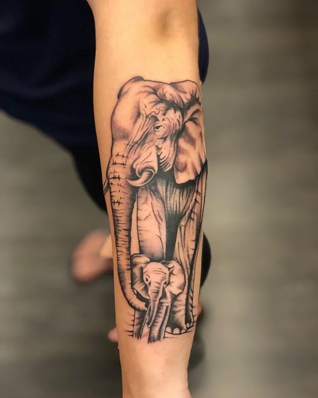 Elephant and Baby Black and Grey Tattoo by Jerry Martin II of Sacred Mandala Studio in Durham, NC.